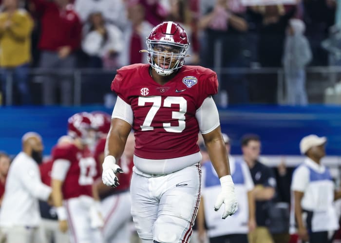 Alabama OT Evan Neal in action during bowl game